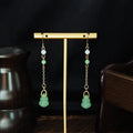 Sixty-Five Chinese Style Bead and Disc Long Earrings view 6