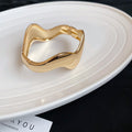 Wide Polished Wave Hinged Bangle In Gold Or Silver Tone view 7