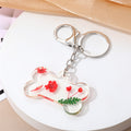 Silver Tone Dog Bone Pressed Flower Resin Keychains view 3