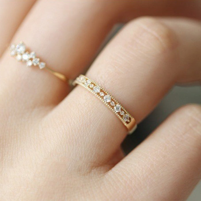 Lace-Edge Band And Three-Stone Solitaire Ring Options In Two Tones