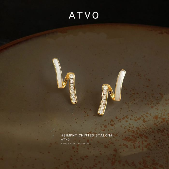 Gold Tone White Angled Bar And Clear Stone Stud Earrings