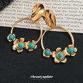 Turquoise Bead Floral Hoop Drop Earrings with Polished Metal Tone Details view 4