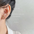 Mini Gold Tone Pave Clear Stone Flower Stud Earrings view 3