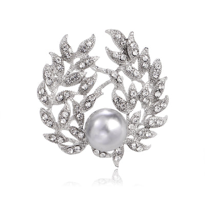 Front product view of the pearl and diamond brooch