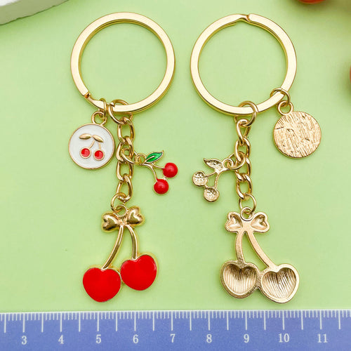 Image 2 showing two key chains with charms on them.
