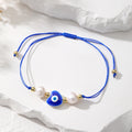 Cord and Pearl Accent Heart Evil Eye Bracelets in Nine Colors view 11