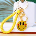 Double Sided Smiley Face Keychains in Yellow and White with Braided Loops view 4