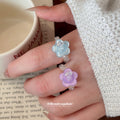 Clear Bead Stretch Flower Rings Purple Or Light Blue view 1