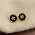 Black Enamel Round Camellia Stud Earrings Gold Rim view 4