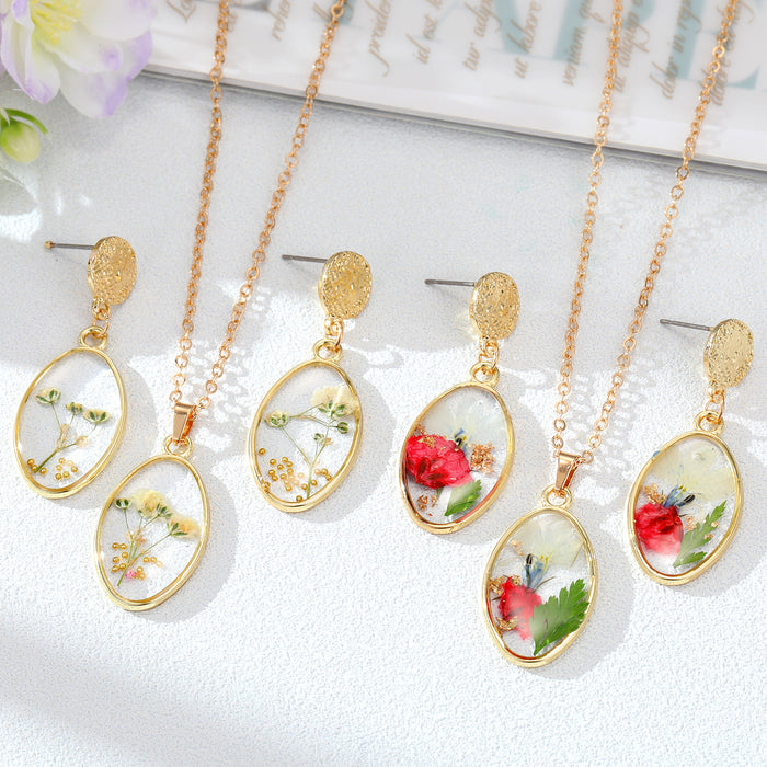 Gold Tone Oval Pressed Flower Necklace and Earring Sets