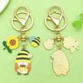Bee and Honeycomb Charm Keychains Featuring Bee Across 33 Pictured Variations view 2
