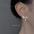 Gold Tone Clear Stone Ribbon Bow And Teardrop Stud Earrings view 2