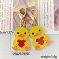 Yellow Heart-Holding Duck Lobster-Clasp Charm with Gold Tone Finish view 5