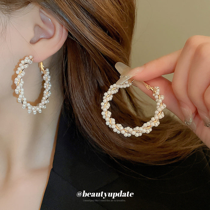 Gold Chain Loop And White Pearl Stud Earrings With Decorative Details