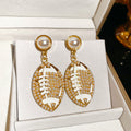 White Oval Leaf and Pearl Drop Earrings in Gold Tone view 6