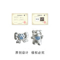 Silver Tone Blue Bear And Paw Butterfly Asymmetric Stud Earrings view 3