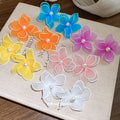 Sheer Petal Flower Stud Earrings with Pearl Centers view 3