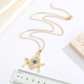 Gold Tone Crystal Geometric Compass and Blue Eye Pendant Necklace view 2