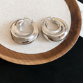 Sculptural Folded Metal Huggie Earrings in Silver and Gold Tone view 6