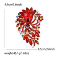 Oval Gem Feather Brooch In Eight Colorways With Polished Metal Detail view 11
