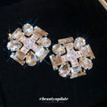 Geometric Clear Crystal Cluster Stud Earrings with Polished Metal Tone Details view 3