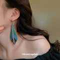 Blue Green Crystal Feather Hook Earrings With Polished Metal Tone Details view 2