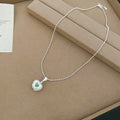 Silver Tone Apple Pendant Necklaces in Blue and White view 7