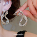 Sculpted Twisted Oval Stud Earrings in Gold and Silver Tone view 3