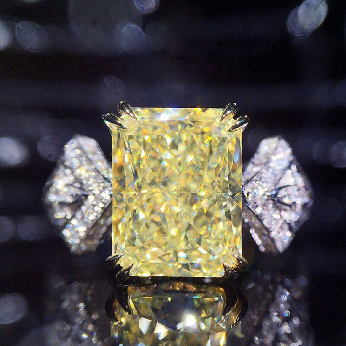 Silver Yellow Emerald Cut Statement Ring In A Polished Decorative Design