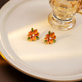 Orange Flower Green Leaf and Pearl Look Stud Earrings view 1