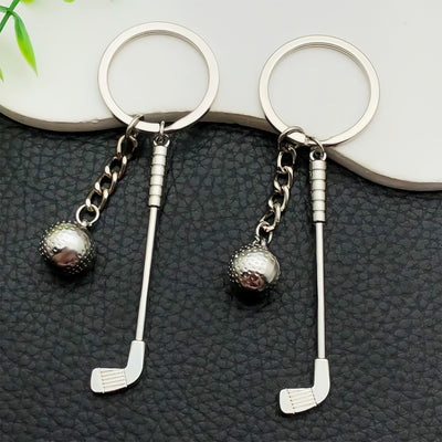 Overview showing the available color and design variations of the antique silver golf club and ball metal keychain