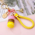 Stacked Macaron and Eiffel Tower Keychains with Braided Wrist Loops view 2