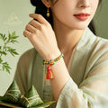 Braided Cord Tassel Charm Bracelets in Eleven Styles view 2