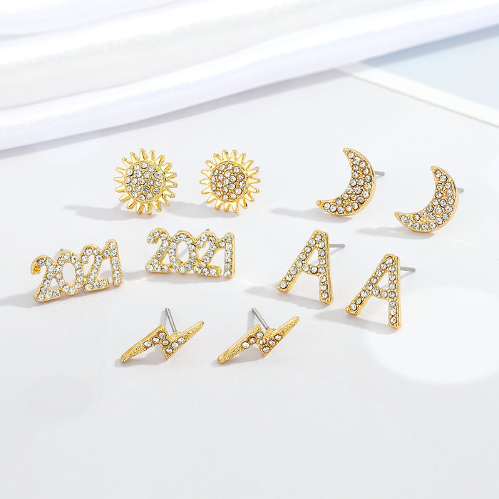 Gold Tone Crystal Year, Letter and Celestial Stud Earrings in Five Designs