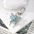 Silver Tone Crystal Winged Fairy Clip Keychains in Five Colors view 2