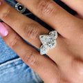 Pear-Shaped Solitaire Three-Stone Halo Ring In Silver Tone view 3