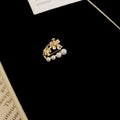 Pearl and Crystal Ear Clips in Four Floral and Bow Designs view 9