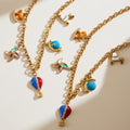 Travel Charm Necklace and Bracelet in Gold and Silver Tone view 3