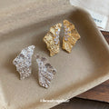 Textured Leaf Crystal Stud Earrings in Silver and Gold Tone view 2