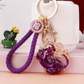 Jeweled Pixiu Keychains in Red Gold and Purple with Fortune Loops view 3