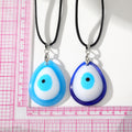Teardrop Resin Evil Eye Pendant Necklaces on Black Cords view 4