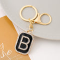 Rhinestone Initial Letter Keychain Black Enamel Gold Tone Tag view 7