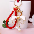 White Enamel Bow Keychains in Plain and Three Braided Loop Options view 1