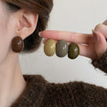 Glossy Dark Brown Oval Stud Earrings with Domed Resin Look view 2