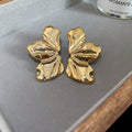 Two Tone Crinkled Leaf Stud Earrings in Gold and Silver view 6
