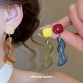 Wavy Resin Drop Earrings in Blue Green Red and Amber view 2
