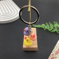 Five Colorful Mini Resin Duck Metal Keychain Designs view 4