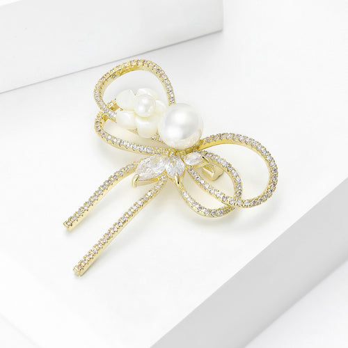 Angled product view showing the brooch surface details