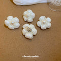 White Flower Pearl Clip On And Stud Earrings With Decorative Details view 4