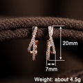 Rose Gold Crossed X Pave CZ Huggie Hoop Earrings Metal view 4